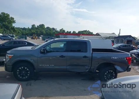 2019 Nissan Titan Pro-4X из США, поврежденный, VIN 1N6AA1E58KN520526